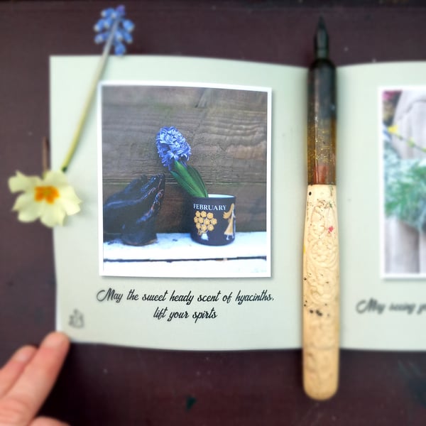 Positivity book , flower photos of each month with up lifting quotes 