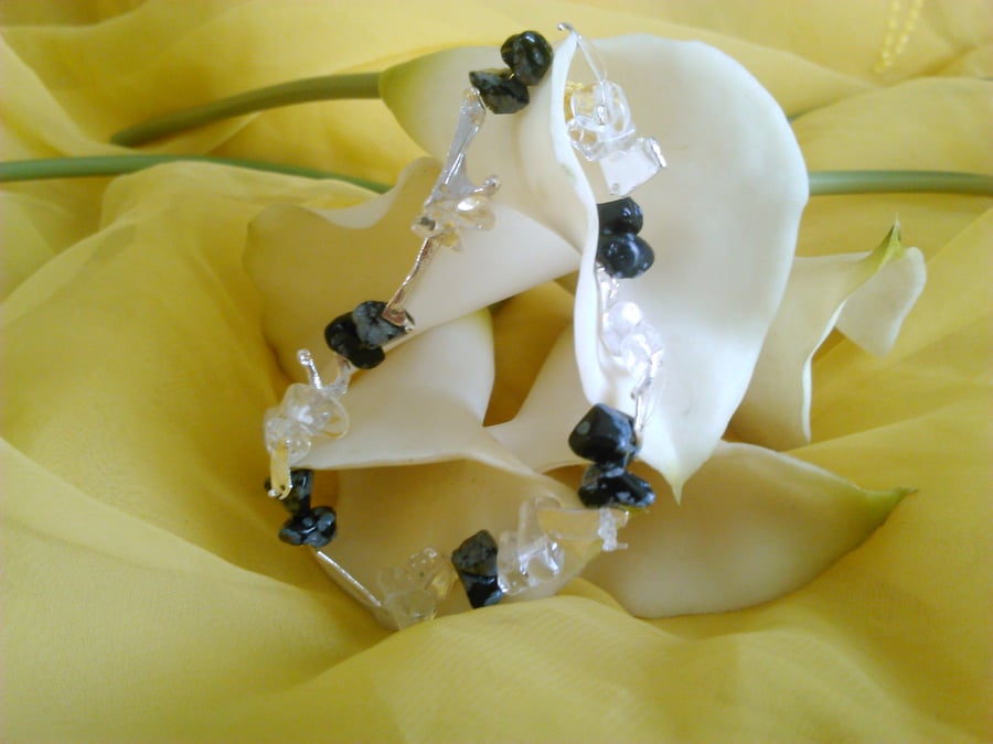 rock crystal, snowflake obsidian and melted silver elasticated bracelet