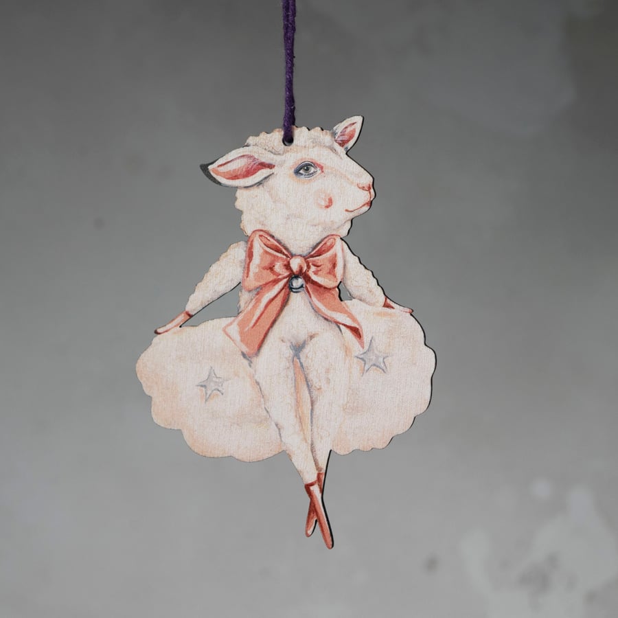 Wooden hanging decoration of a sheep on a cloud, called Elliot