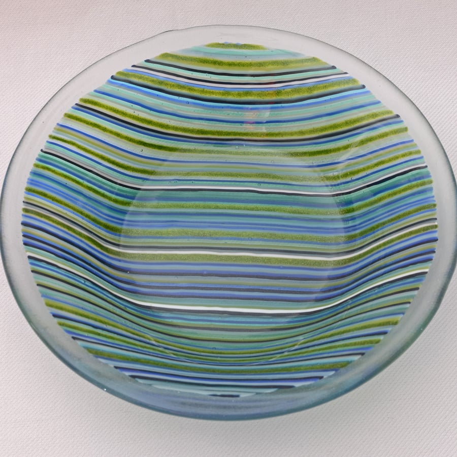 Fused glass round bowl with thin blue and green stripes, 18cm diameter