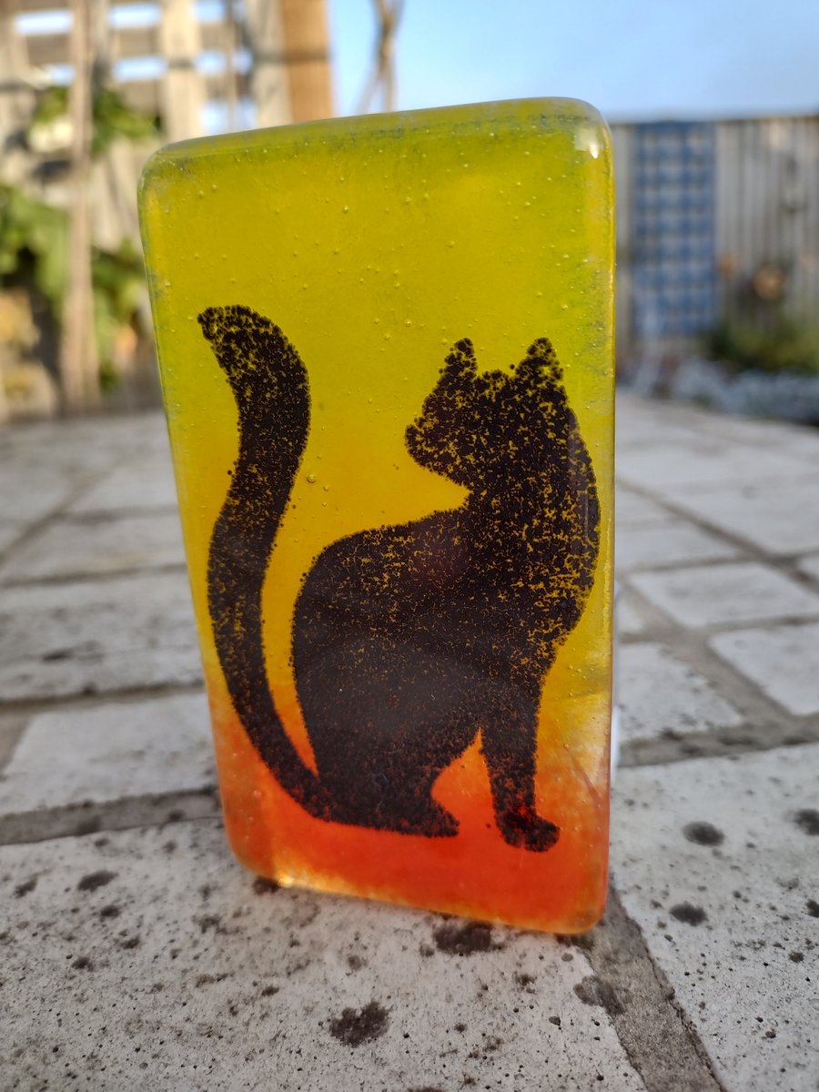Fused glass tealight candle holder black cat on sunset background