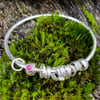 Silver and ruby bangle  No Worries Bangle