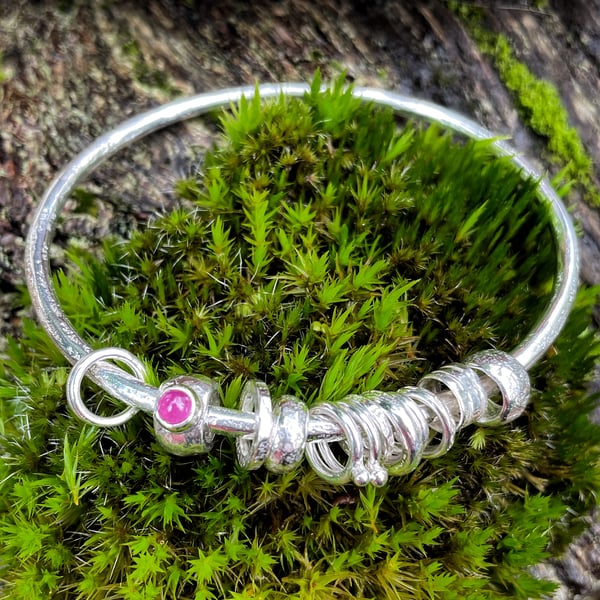 Silver and ruby bangle  No Worries Bangle