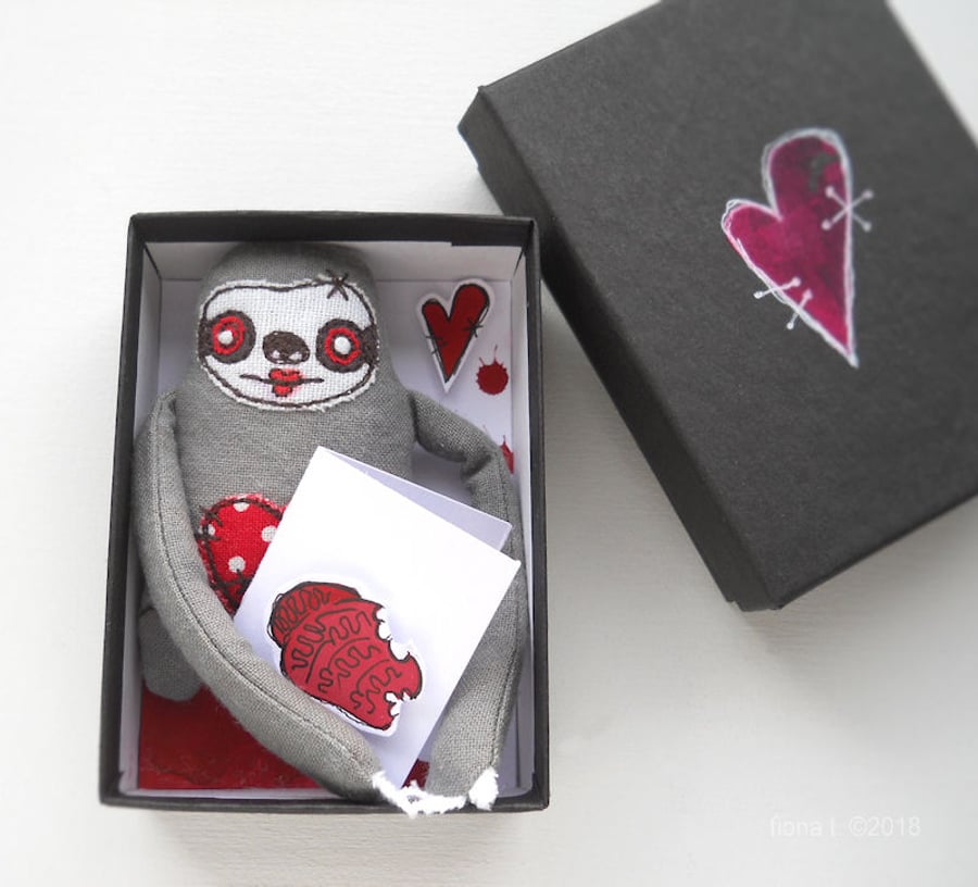 miniature freehand embroidered zombie sloth in a box 
