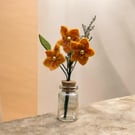 Three miniature felted flowers in glass bottle vase (yellow)
