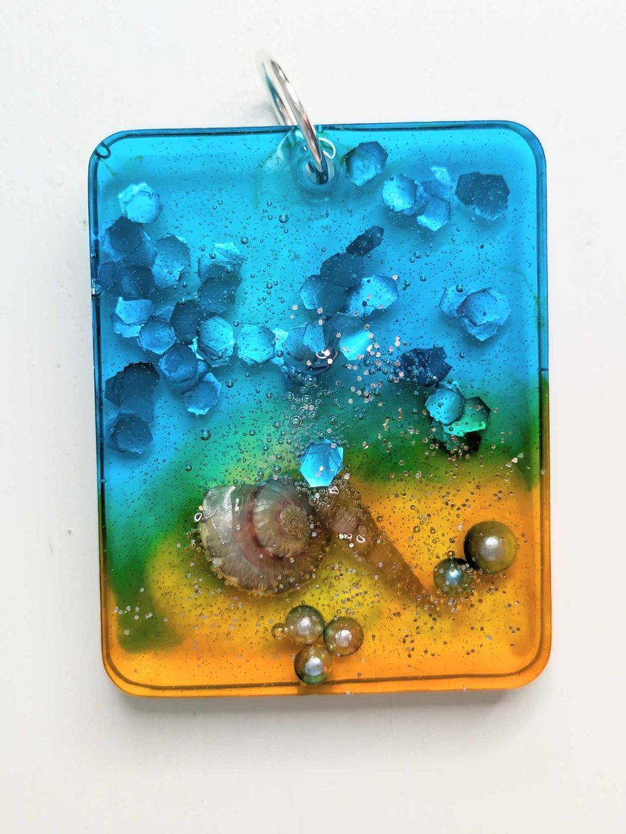 Beach Inspired Resin Pendant With Glitter and Shells