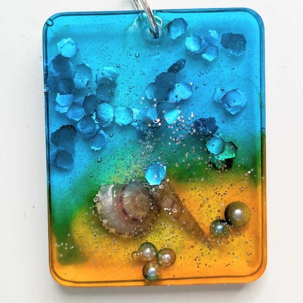 Beach Inspired Resin Pendant With Glitter and Shells
