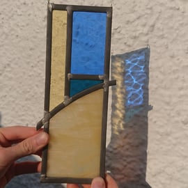 Stained glass abstract beach scene, sea, sun and sky leaded panel