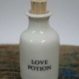 Small porcelain bottle with love potion wording