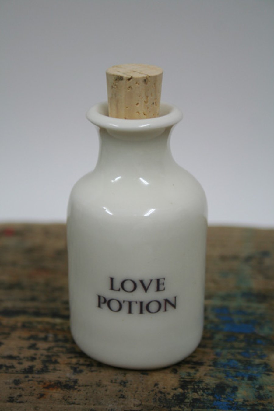 Small porcelain bottle with love potion wording