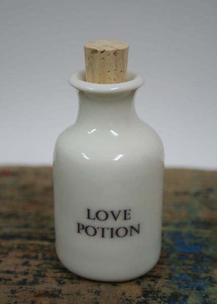 Small porcelain bottle with love potion wording