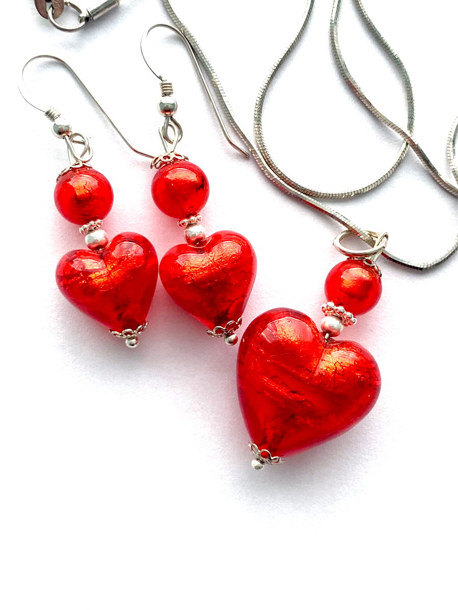 Murano glass red pendant and earrings set with sterling silver.