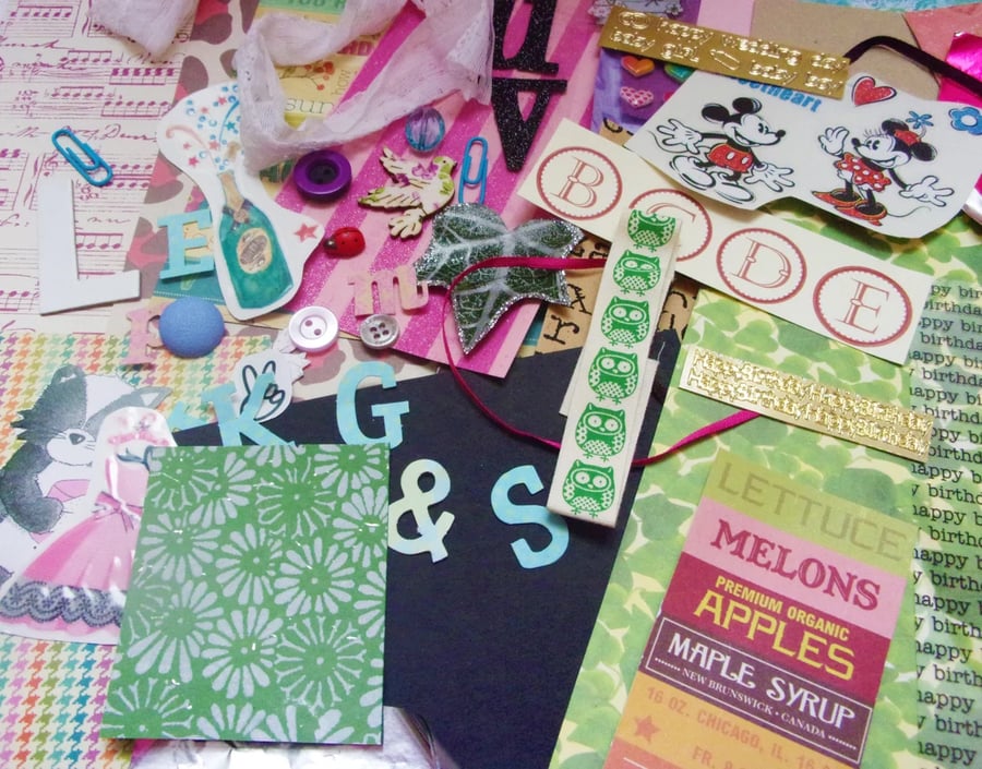 Scrapbook pack: minimum of 50 mixed pieces of paper and embellishments