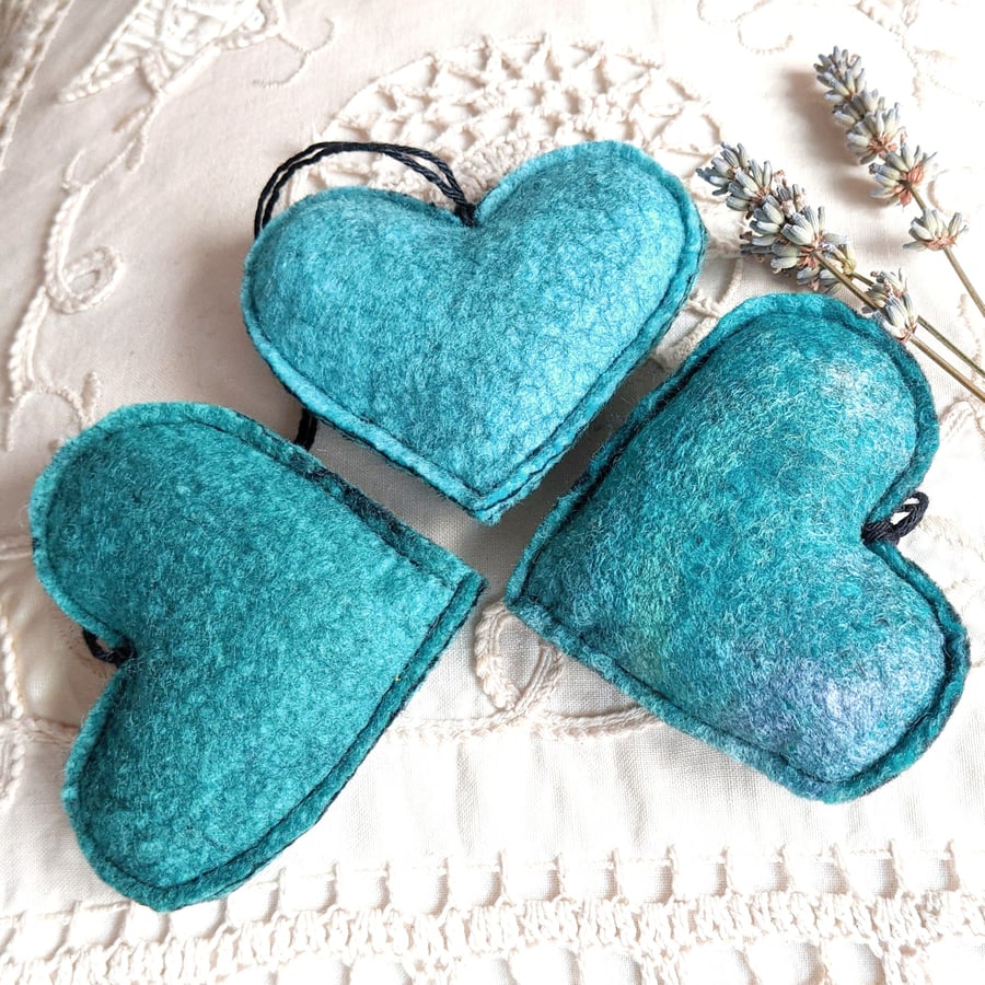 Three lavender hearts in shades of turquoise