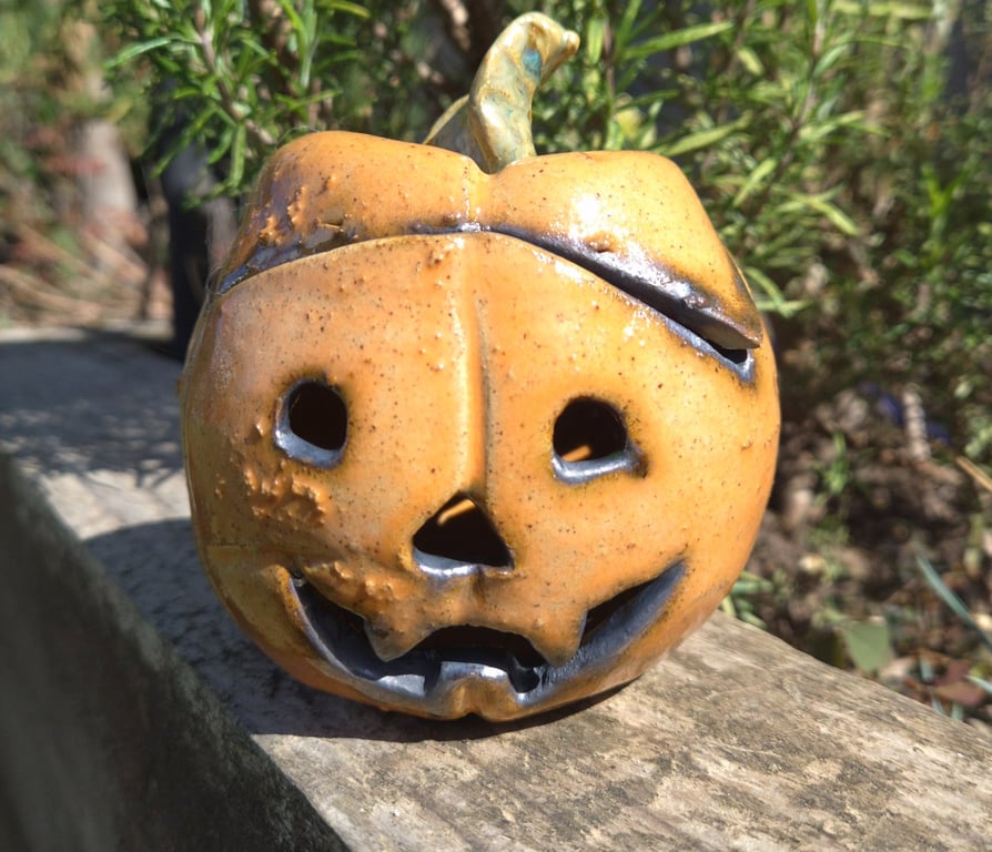 Orange pumpkin tea light