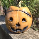 Orange pumpkin tea light