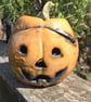 Orange pumpkin tea light