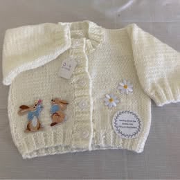 Cream cardigan with bunny rabbits
