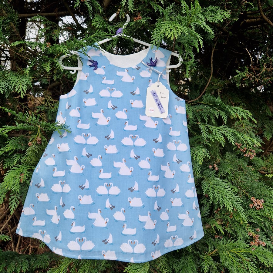 Age: 2-3yr Pale Blue Swan cotton dress. 