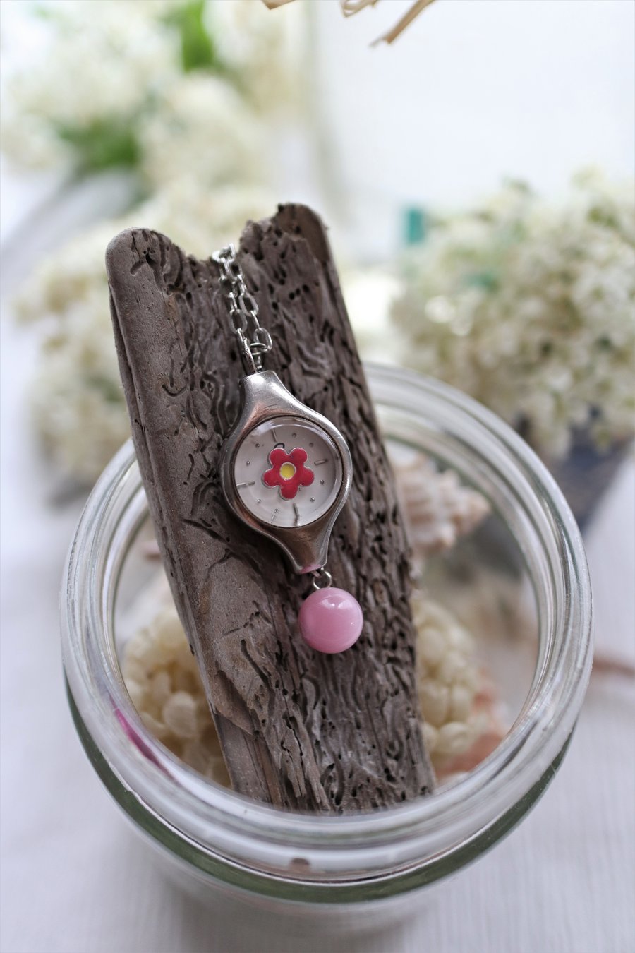 Upcycled ladies watch parts decorated with flower bead and cat eye bead necklace