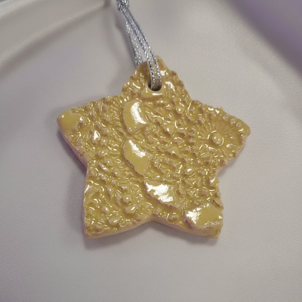 Yellow hanging star decoration 