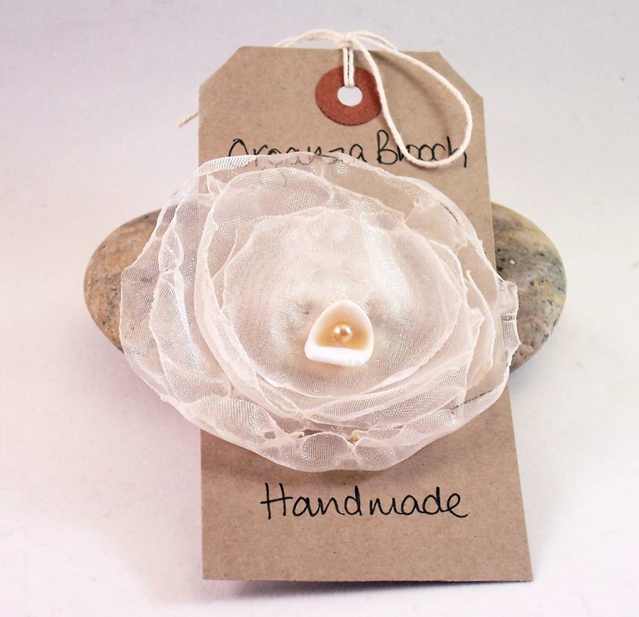 Burned organza and shell brooch