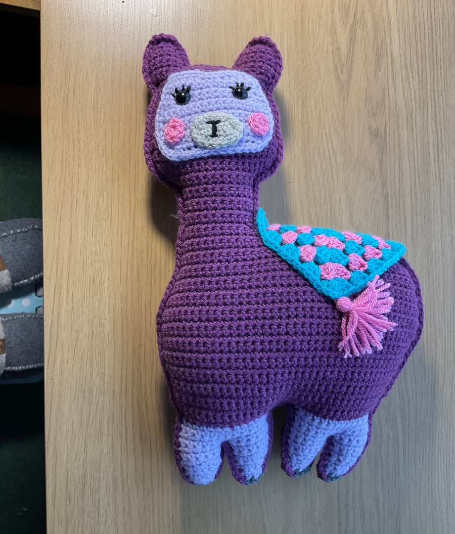 Llama Cuddler. Handmade crocheted amigurumi