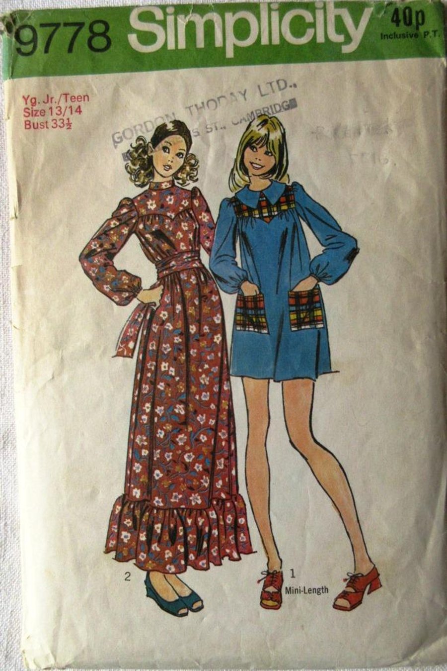 A vintage sewing pattern for a young junior-teen (girl's) dress in size 13-14