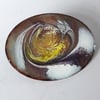 brooch - oval scrolled gold, white and amethyst over clear enamel