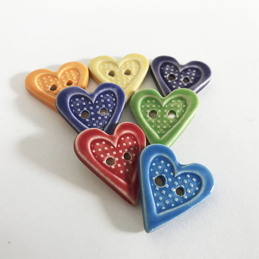 Set of seven little heart shaped ceramic handmade buttons 