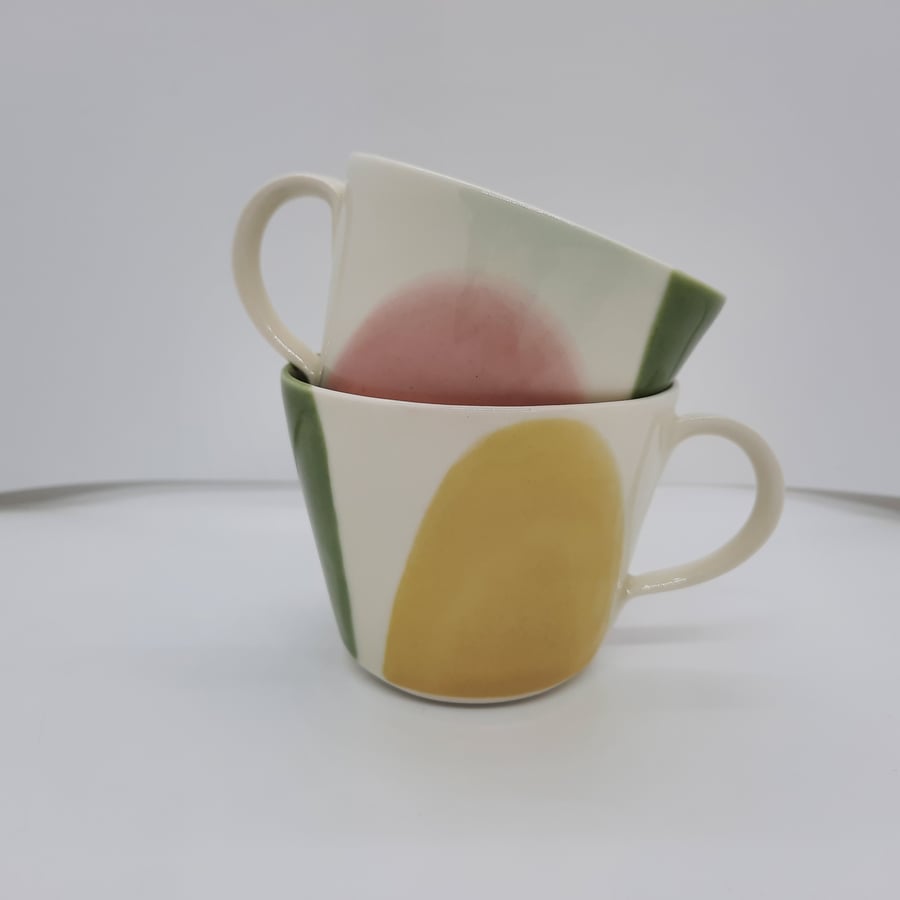Hand made yellow pink and green ceramic espresso cups, after dinner coffee cups.
