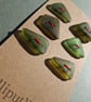 Set of six green sea glass buttons