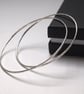 One skinny sterling silver bangle with hammered texture 