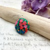 Spring tulips red pink blue and yellow fabric button brooch colour pop