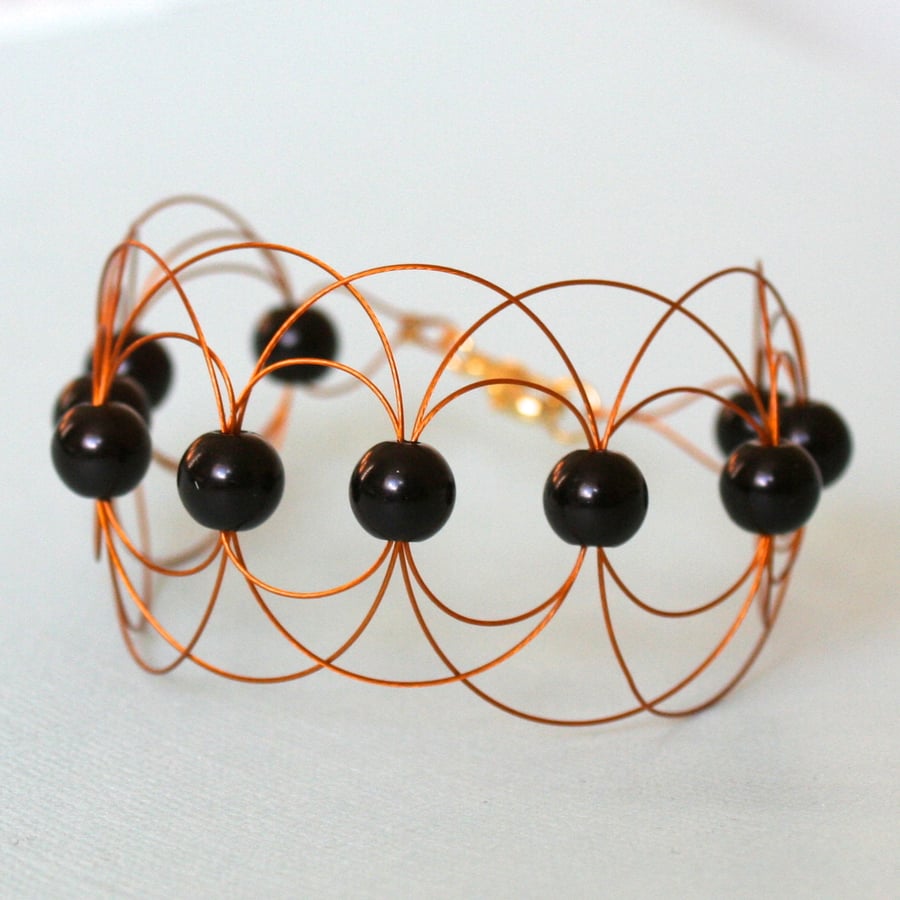 Black and gold cuff bracelet