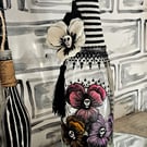 Possessed pansies (pastel)-  Decorative Upcycled Bottle 