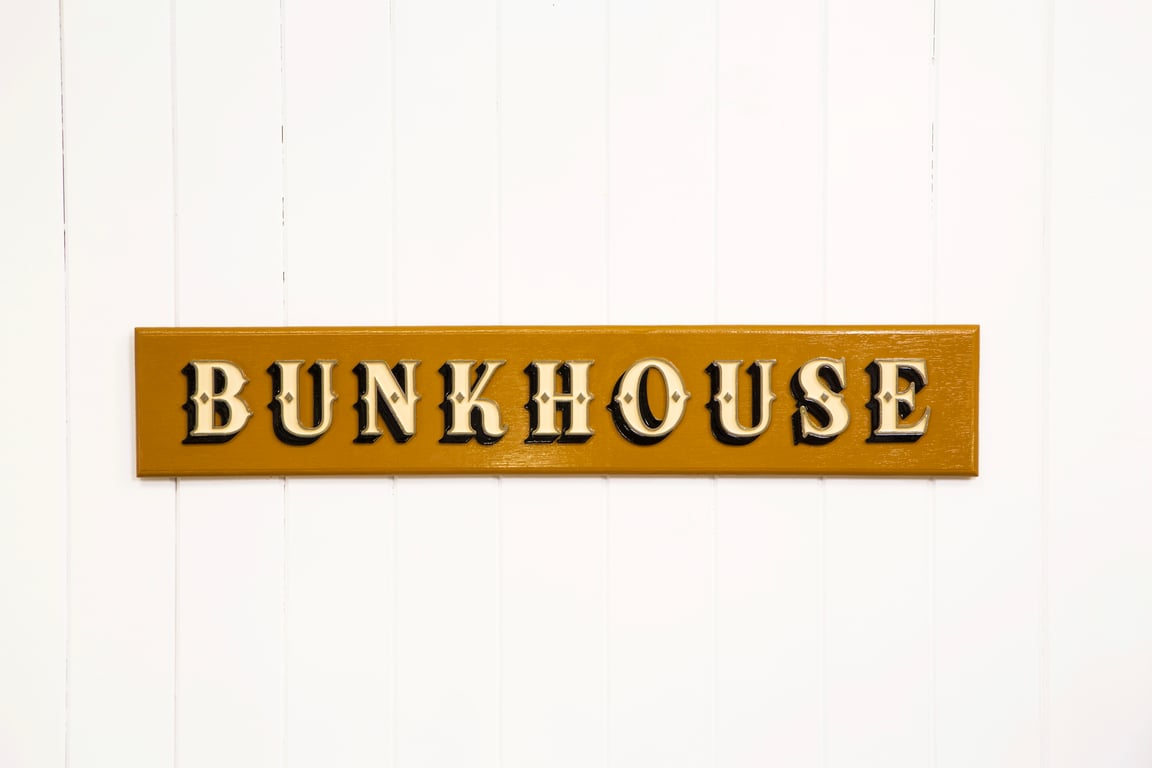 WOODEN TYPOGRAPHIC SIGN: BUNKHOUSE - OCHRE