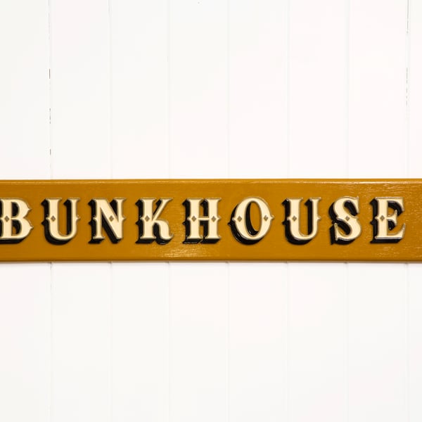 WOODEN TYPOGRAPHIC SIGN: BUNKHOUSE - OCHRE