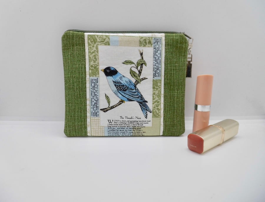 Green make up purse with bird and poetry The Thrush's Nest