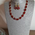 UNIQUE HANDMADE RED AND GOLD NECKLACE AND EARRING SET.