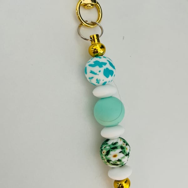 Mint and daisy  pastel toned  keyring  or purse charm 