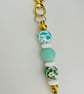 Mint and daisy  pastel toned  keyring  or purse charm 