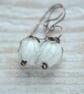 White Lampwork Glass Flower Bud Copper Earrings - Image 1