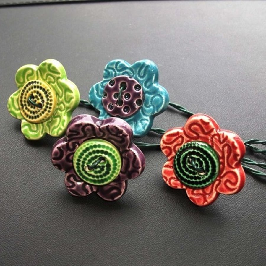 Set of four ceramic button flowers