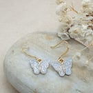 Beautiful handmade 18k gold plated earrings with silverglitter acrylic butterfly