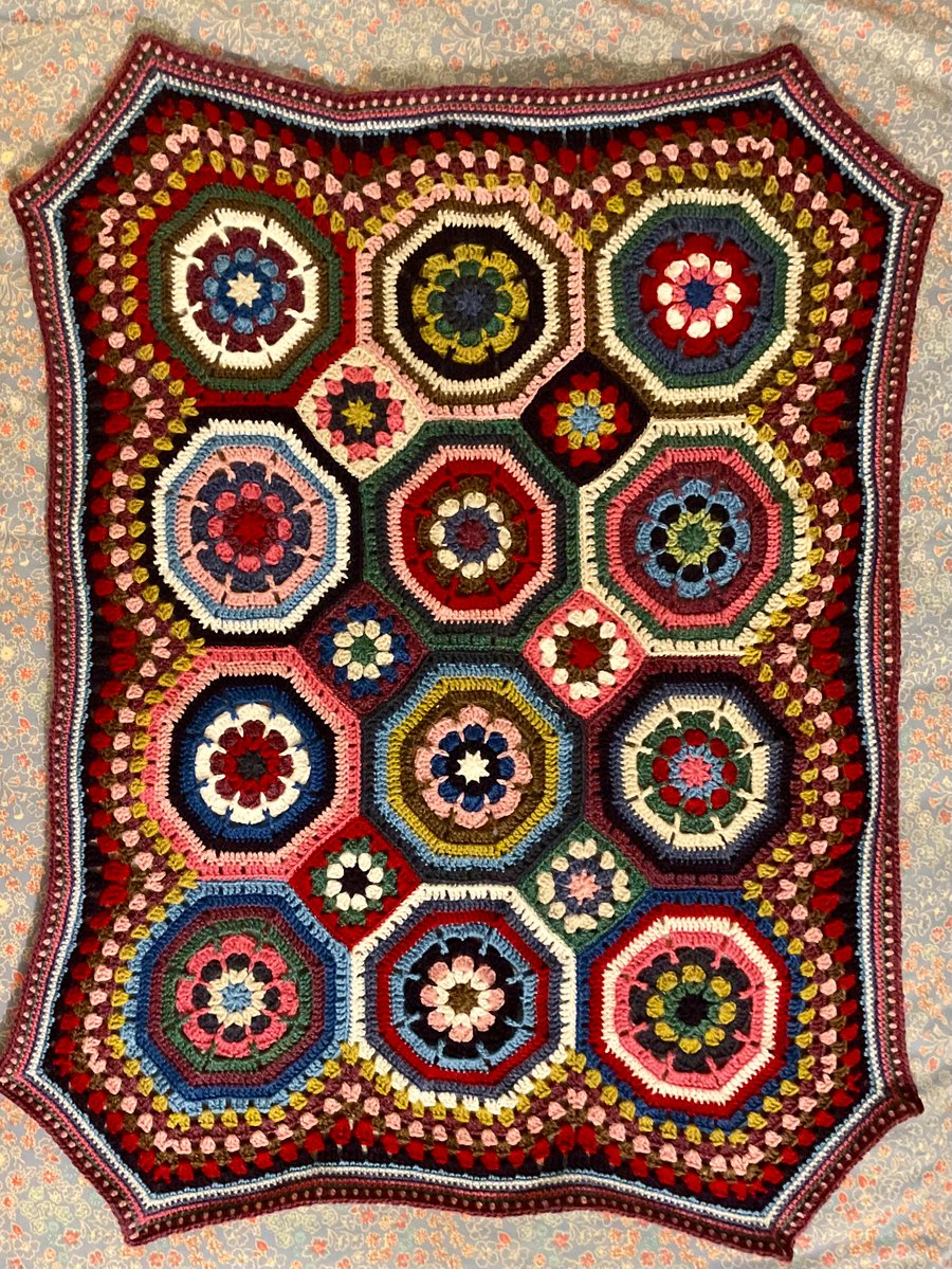 Small crocheted baby blanket. 