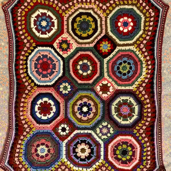 Small crocheted baby blanket. 