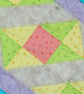 Handmade Quilted table runner with pale spring fabrics and scattered stars. - Image 3