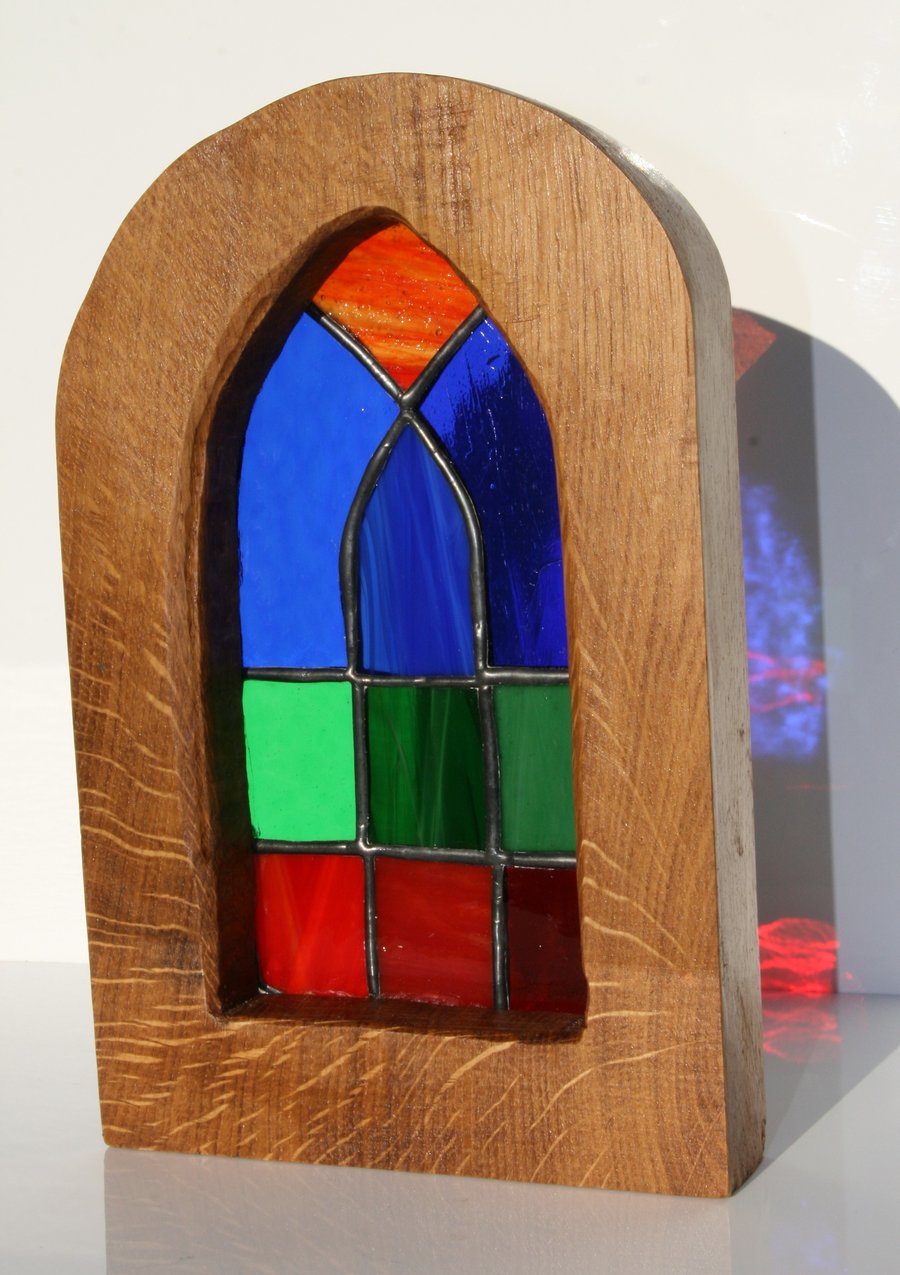Stained glass ‘Cathedral’ window in a solid oak surround