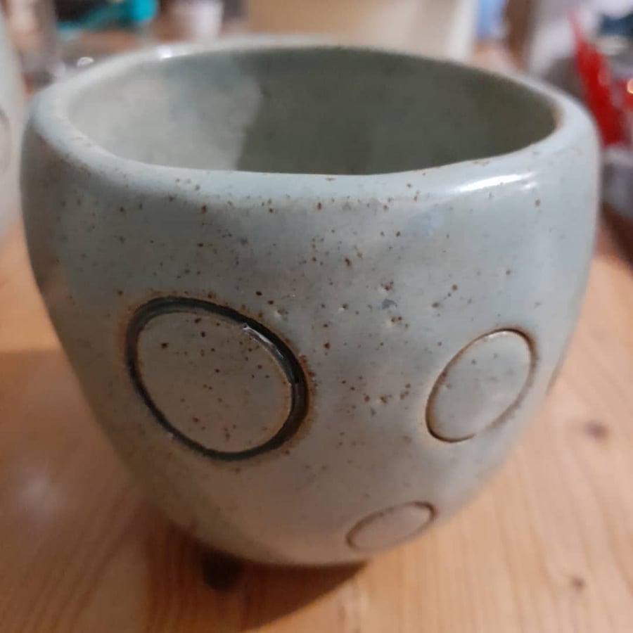 Handmade stoneware pot with celadon glaze